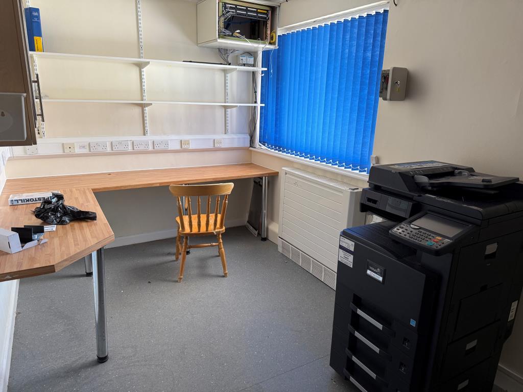 Lot: 87 - FORMER NHS PREMISES WITH POTENTIAL FOR DEVELOPMENT - Front office with desk and window